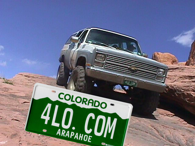 My old suburban with 4LO.COM plates