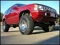 Front view of lifted 1994 Grand Cherokee on 33 inch BFGs.