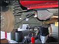 RE8003 Showing right rear lower control arm removed.
