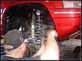 RE8003 Prying out front coils.